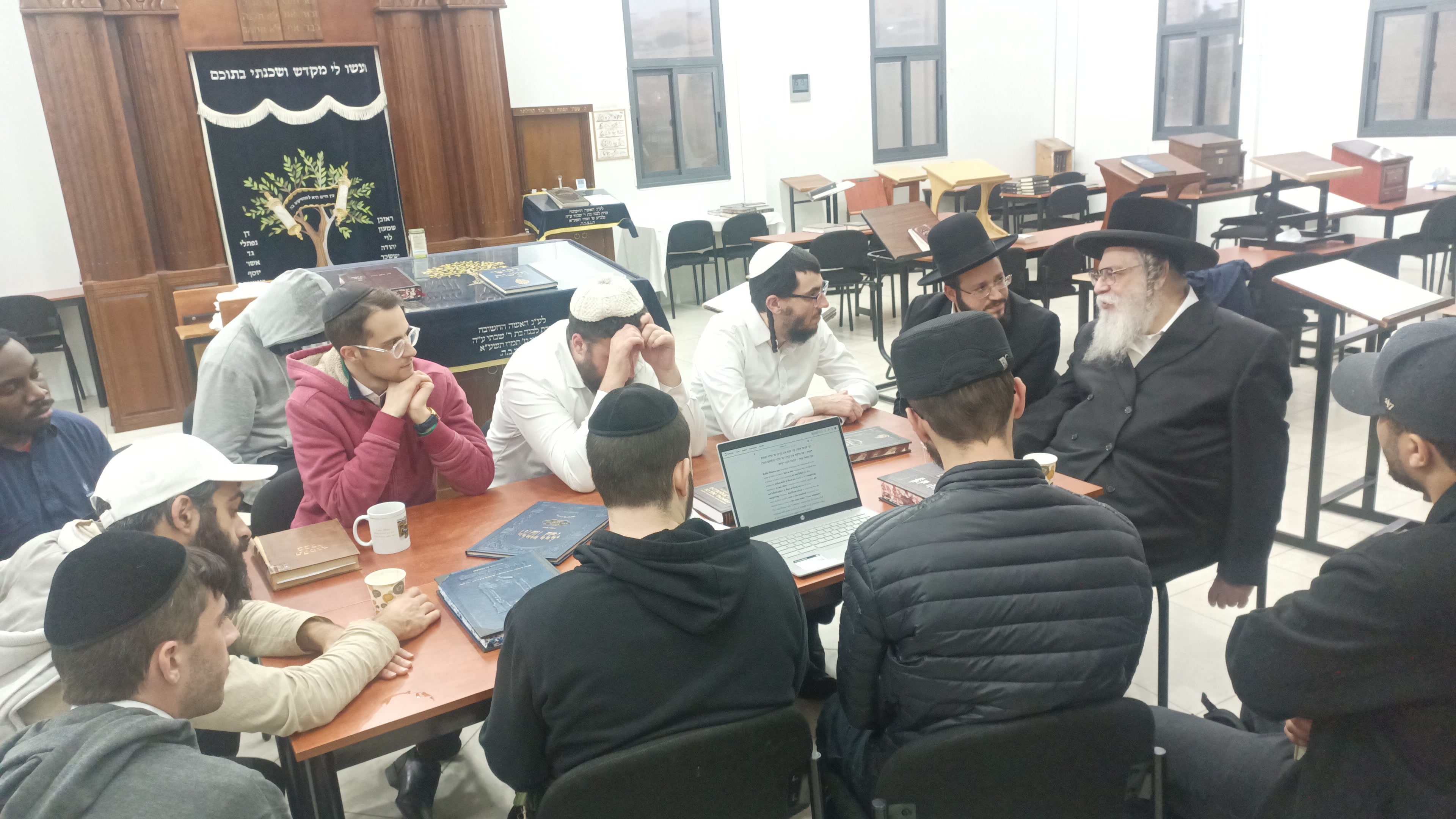 Listening to Rabbi Kivak at The Breslov Yeshiva